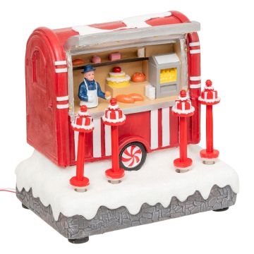 VILLAGGIO STAND DOLCI MUSICALE CON LED/MOVIMENTO A BATTERIA 15X10 H. 14.5CM