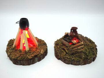 BASE MUSCHIATA CON FUOCO E LUCE A BATTERIA DIAM. 8 H. 7CM ASS.