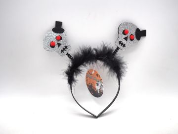 CERCHIETTO HALLOWEEN CON PIUME E TESCHI 21X21CM 