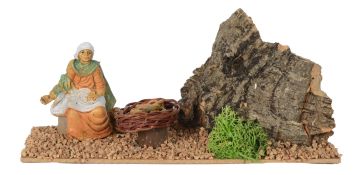 DONNA CON CIAMBELLE 23X9CM H 12CM